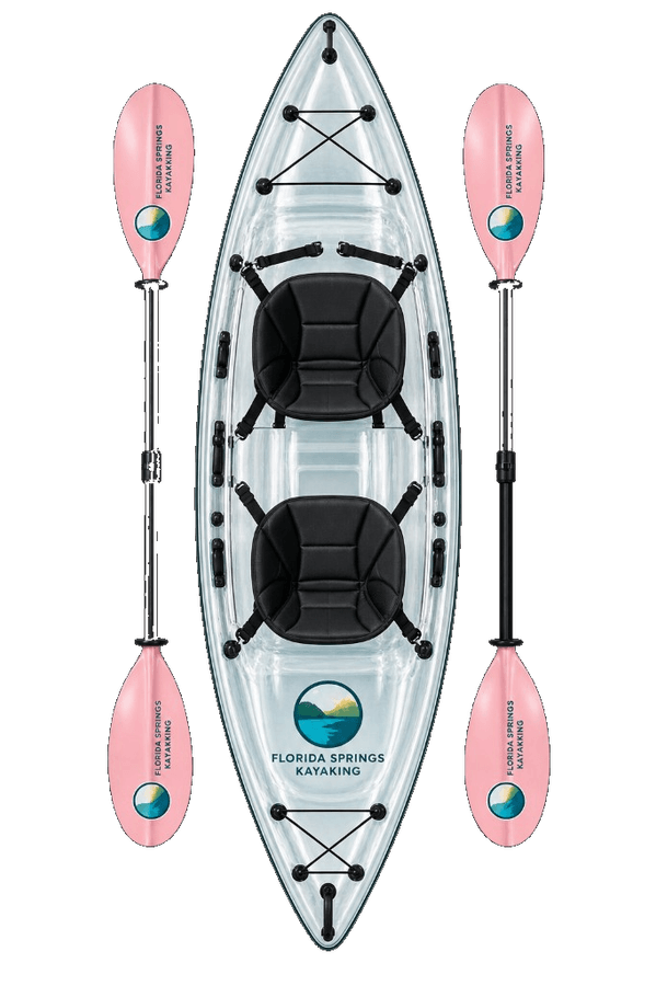 A transparent tandem kayak with two padded seats, shown with two pink two-piece paddles